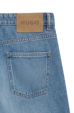 Loose-Fit Jeans mit weitem Bein und Charm-Akzenten