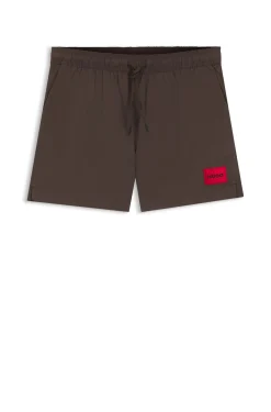 Schnell trocknende Badeshorts mit rotem Logo-Label