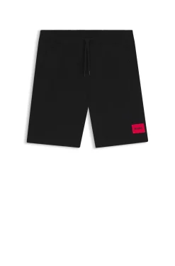 Shorts aus Baumwoll-Terry mit rotem Logo-Label
