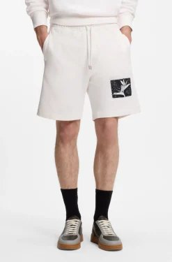Shorts aus Baumwoll-Terry mit Artwork-Patch
