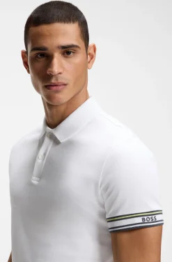 Slim-Fit Poloshirt aus Baumwolle mit gestreiften Ärmelbündchen