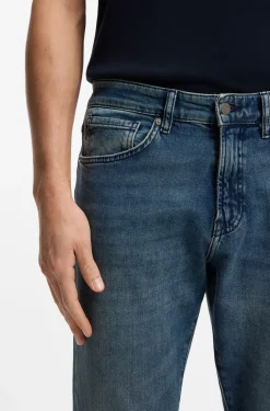 Tapered-Fit Jeans aus verwaschenem blauem Stretch-Denim